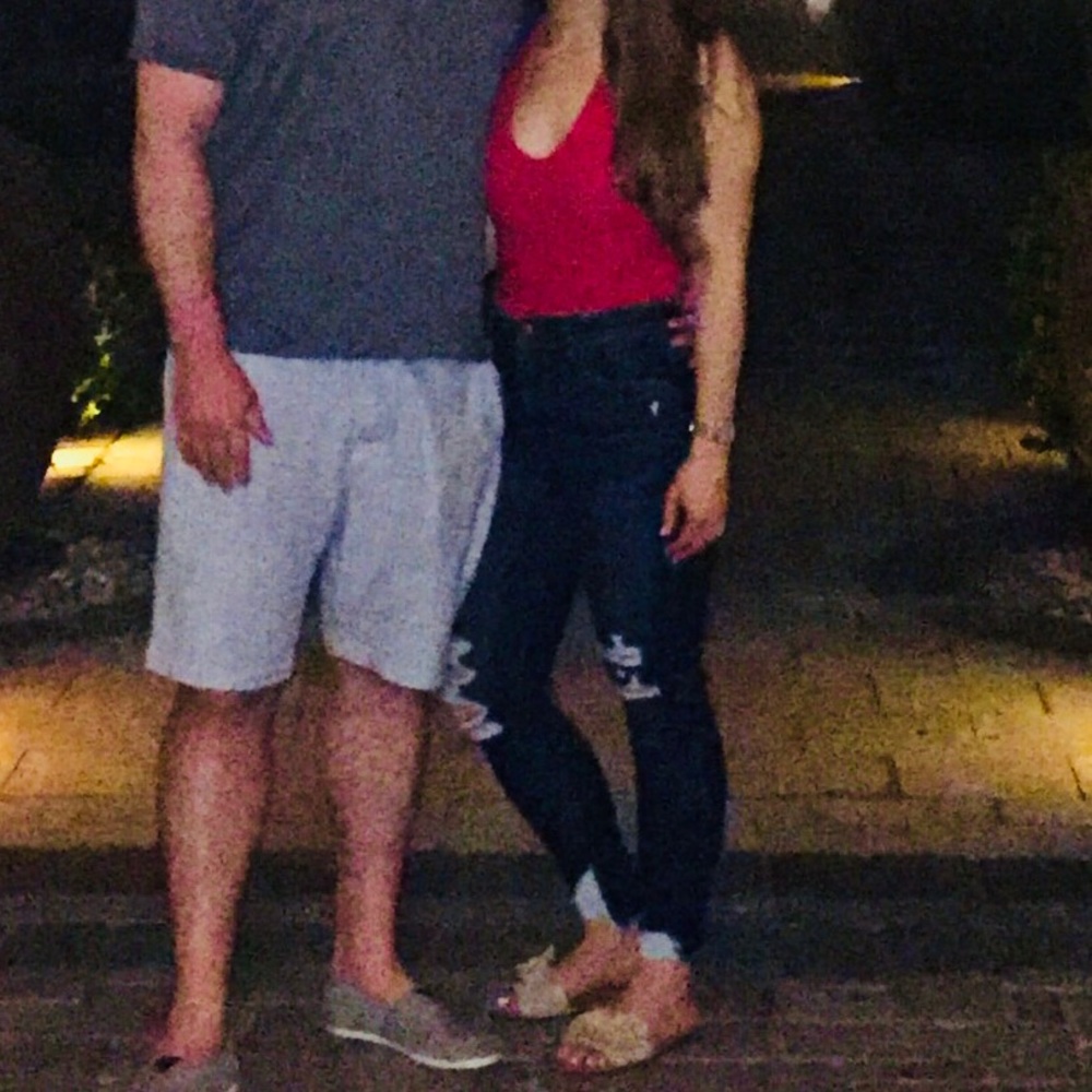 Red lush body suit with a crisscrossed back